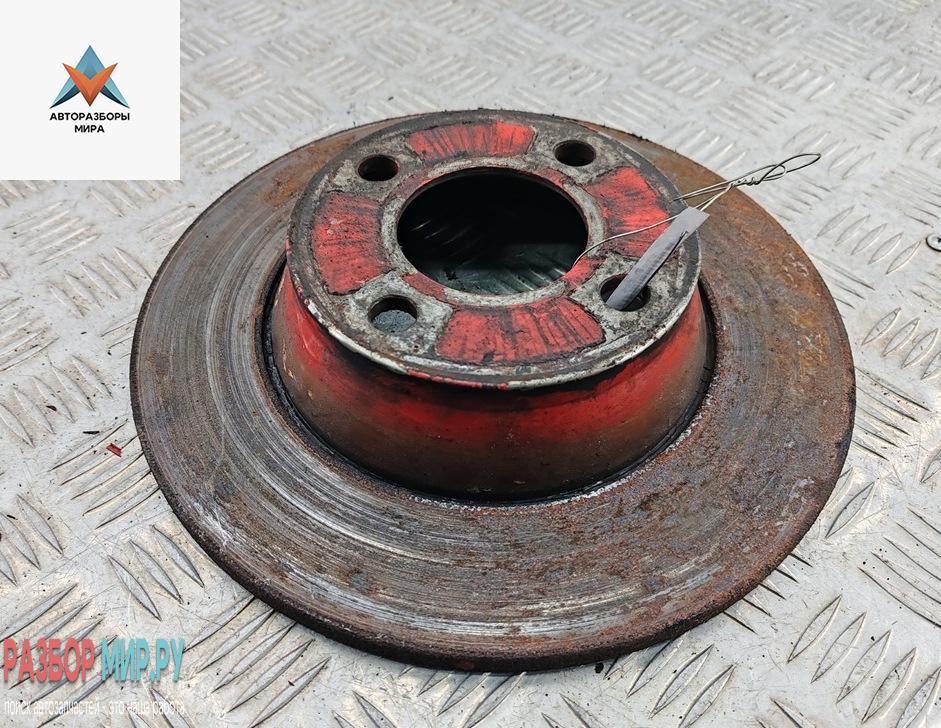 диск тормозной передний Audi 80 8C/B4 1992, 2.0 л., бензин, МКПП, красный, седан - фото №1