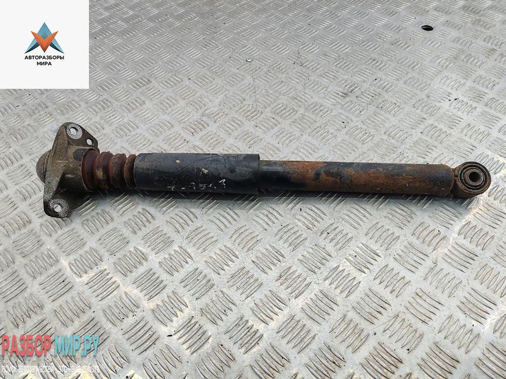 амортизатор задний левый Volkswagen Passat B6 2007, 2.0 л., дизель, МКПП, чёрный, универсал - фото №1