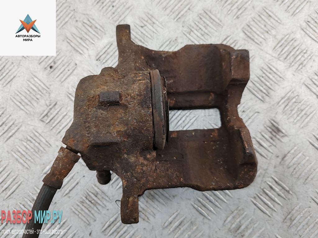 суппорт передний правый Audi 80 8C/B4 1994, 1.6 л., бензин, МКПП, синий, универсал - фото №1