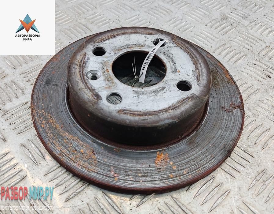 диск тормозной задний Opel Astra G 2002, 1.6 л., бензин, МКПП, серый, хетчбэк 5 дв. - фото №1