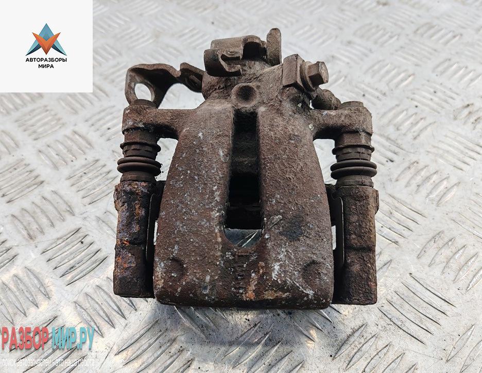 суппорт задний правый Opel Astra G 2002, 1.6 л., бензин, МКПП, серый, хетчбэк 5 дв. - фото №1