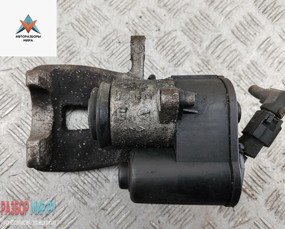 суппорт задний правый Volkswagen Passat B6 2007, 2.0 л., дизель, МКПП, чёрный, универсал - фото №1