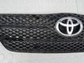 решетка радиатора Toyota Corolla 9 поколение (E120/E130) [рестайлинг] 2004, 2.0 л., дизель, МКПП, хетчбэк 5 дв. - фото №2