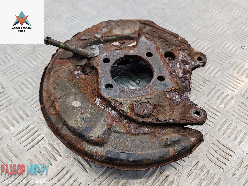 Механизм развода задних тормозных колодок левый Toyota Yaris Verso 2001, 1.3 л., бензин, МКПП, серый, минивэн - фото №1