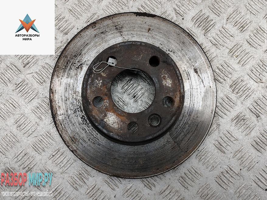 диск тормозной передний Volkswagen Transporter T4 1997, 2.4 л., дизель, МКПП, белый, микроавтобус - фото №1