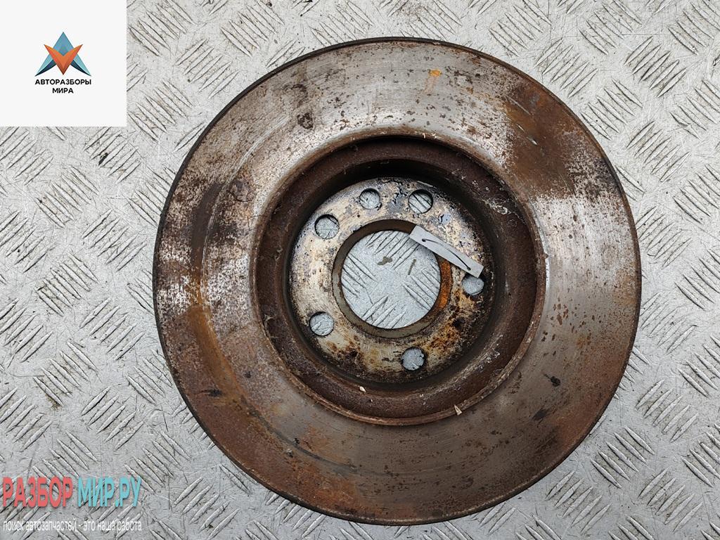 диск тормозной передний Volkswagen Transporter T4 1991, 2.4 л., дизель, МКПП, зелёный, микроавтобус - фото №1