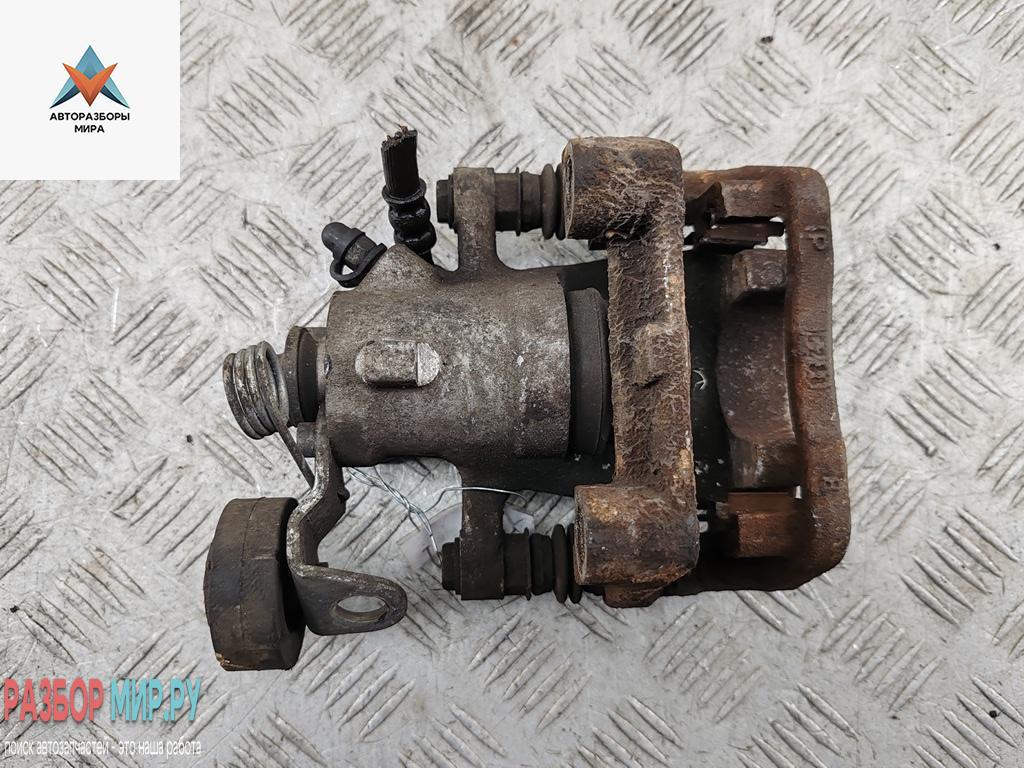 суппорт задний левый Opel Zafira 1 поколение (A) 2002, 2.2 л., бензин, МКПП, чёрный, минивэн - фото №1