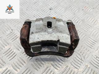 суппорт передний левый Toyota Yaris Verso 2001, 1.3 л., бензин, МКПП, серый, минивэн