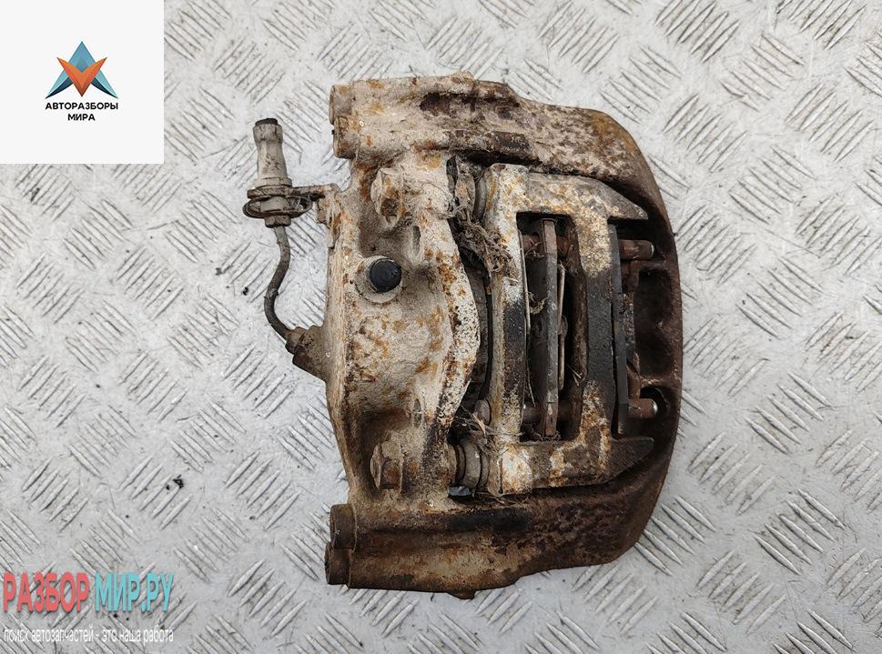 суппорт передний левый Volkswagen Transporter T4 1991, 2.4 л., дизель, МКПП, зелёный, микроавтобус - фото №1