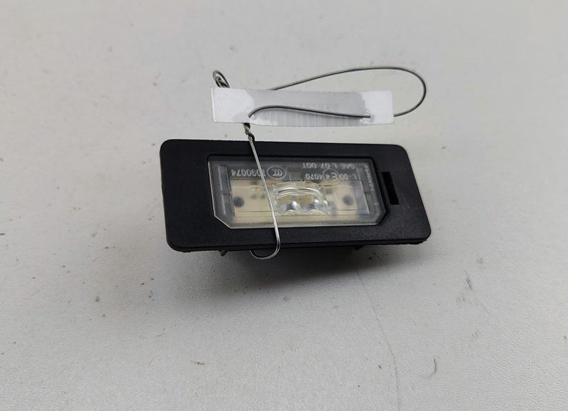 подсветка номера BMW X1 E84 2011, 2.0 л., дизель, АКПП, чёрный, внедорожник 5 дв., 7193293 - фото №1