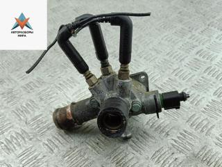 фланец (тройник) системы охлаждения Volkswagen Golf 4 поколение 2001, 1.9 л., дизель, МКПП, серый, универсал, 038121133A