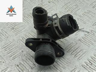 фланец (тройник) системы охлаждения Ford Focus 3 поколение 2013, 1.0 л., бензин, МКПП, чёрный, хетчбэк 5 дв., CM5G8A529GA