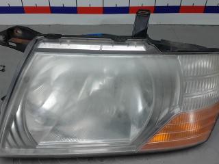 фара левая Mitsubishi Pajero 4 поколение 2006, 3.2 л., дизель, АКПП, внедорожник 5 дв.