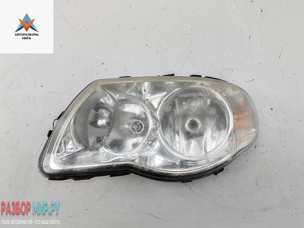 фара левая Chrysler Voyager 5 поколение 2007, 2.4 л., бензин, МКПП, чёрный, минивэн, 04857831AC - фото №1