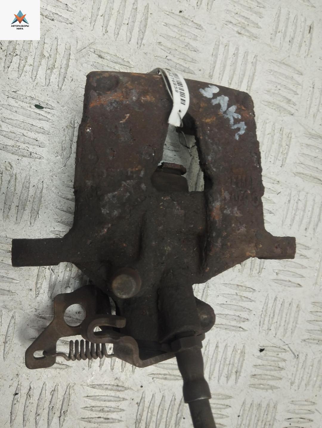 суппорт задний правый Ford Mondeo 3 поколение 2001, 1.8 л., бензин, МКПП, серый, универсал, 0204Y01172 - фото №1