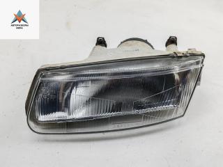 фара левая Mitsubishi Carisma 1 поколение 1998, 1.8 л., бензин, АКПП, зелёный, седан, 08-214-1153L