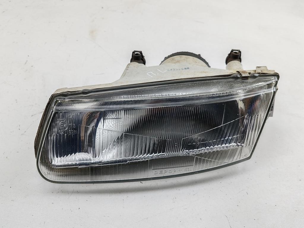 фара левая Mitsubishi Carisma 1998, 1.8 л., бензин, АКПП, зелёный, седан, 08-214-1153L