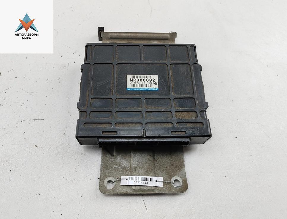 блок управления АКПП Mitsubishi Carisma 1 поколение 1998, 1.8 л., бензин, АКПП, зелёный, седан, MD388802 - фото №1