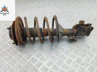 стойка передняя Mitsubishi Carisma 1 поколение 1998, 1.8 л., бензин, АКПП, зелёный, седан