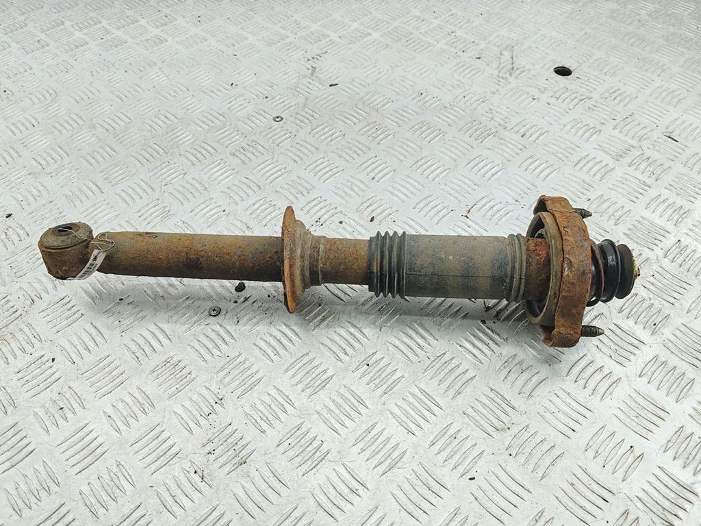 амортизатор задний левый Mitsubishi Carisma 1998, 1.8 л., бензин, АКПП, зелёный, седан