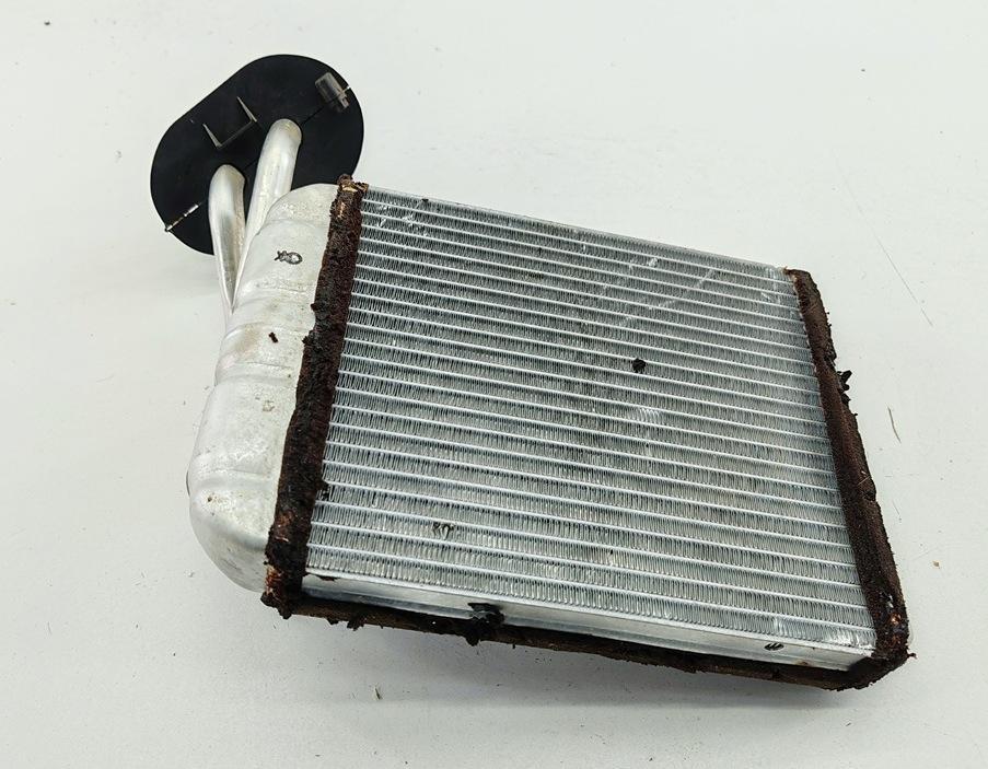 радиатор отопителя (печки) Volkswagen Touareg 1 поколение 2005, 2.5 л., дизель, АКПП, чёрный, внедорожник 5 дв., 7H1819121 - фото №1