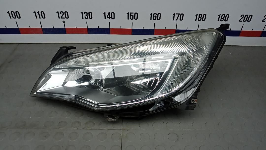 фара левая Opel Astra J 2010, 1.6 л., бензин, МКПП, хетчбэк 5 дв. - фото №1