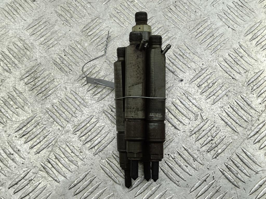 форсунка Volkswagen Passat B5 1999, 1.9 л., дизель, МКПП, зелёный, универсал, 028130202H, 028130202J - фото №1