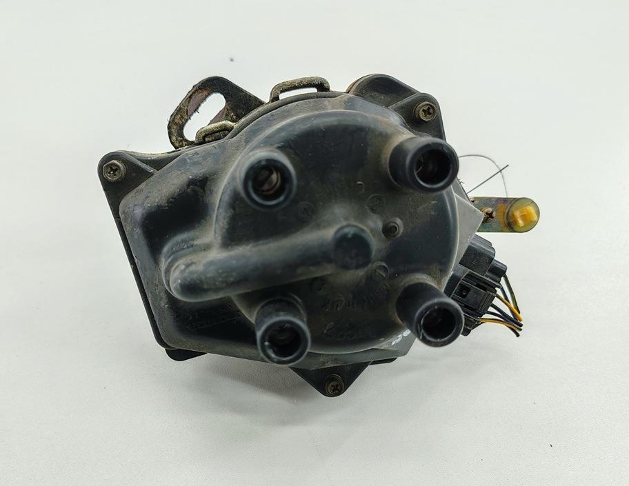 распределитель зажигания (трамблёр) Honda Civic 6 поколение 1997, 1.4 л., бензин, МКПП, синий, хетчбэк 5 дв., 30100P1JE01 - фото №1