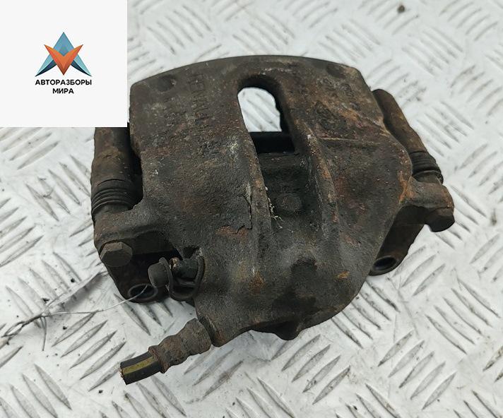 суппорт передний левый Renault Scenic 1 поколение 1998, 1.6 л., бензин, МКПП, зелёный, минивэн - фото №1