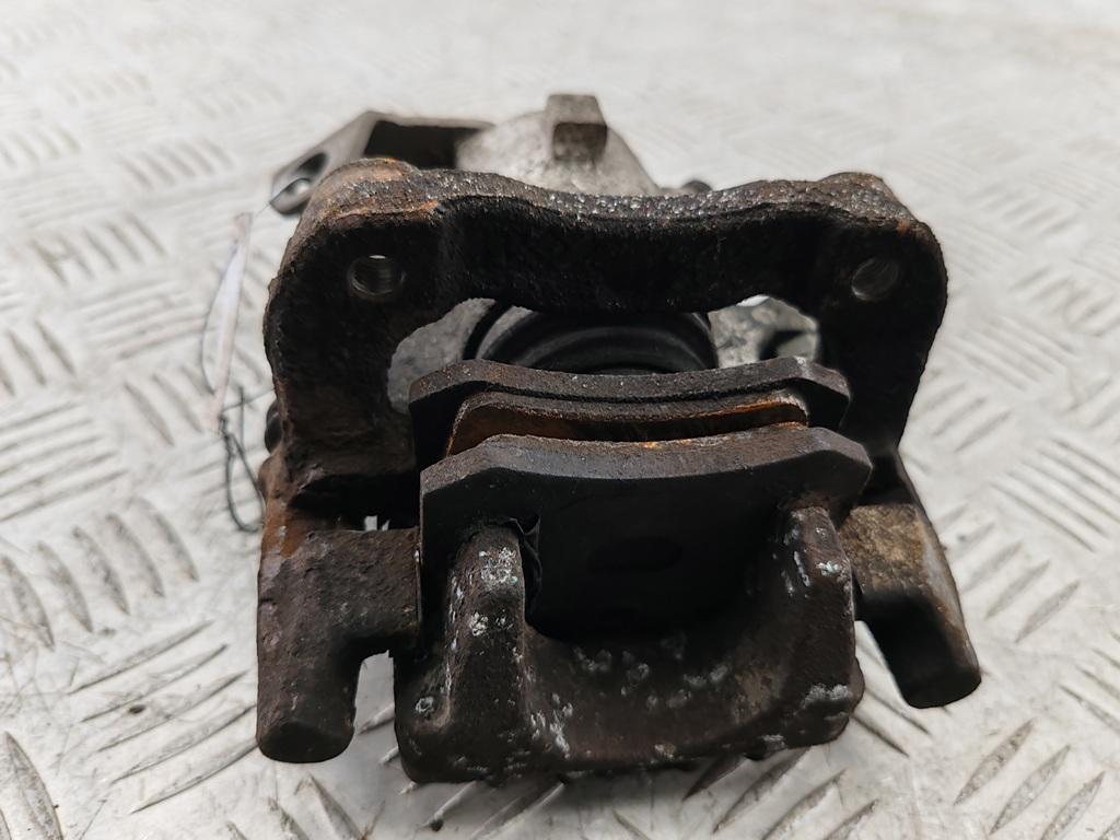 суппорт задний левый Volkswagen Bora 1 поколение 2001, 1.6 л., бензин, МКПП, серый, универсал - фото №1
