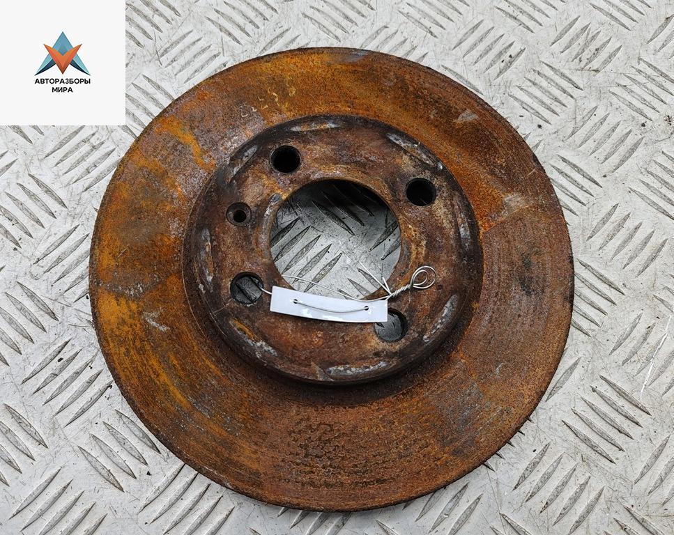 диск тормозной передний Volkswagen Vento 1 поколение 1997, 1.6 л., бензин, АКПП, зелёный, седан - фото №1
