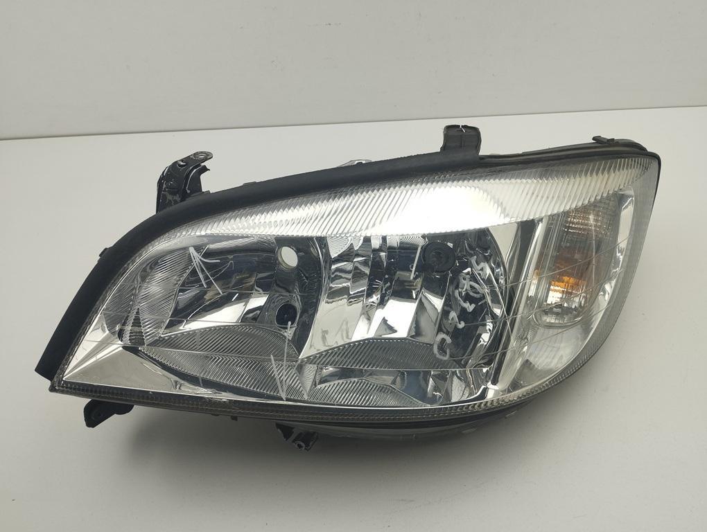 фара левая Opel Zafira A 2005, 2.2 л., бензин, МКПП, чёрный, минивэн, 90582021