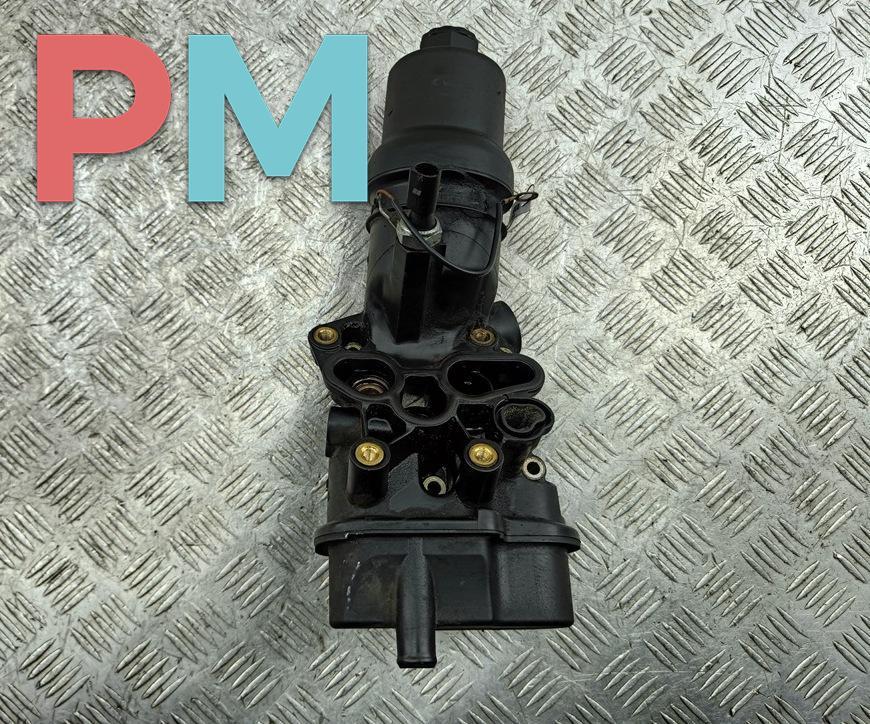 корпус масляного фильтра Volkswagen Passat B6 2005, 2.0 л., бензин, АКПП, универсал, 06D115397G - фото №1