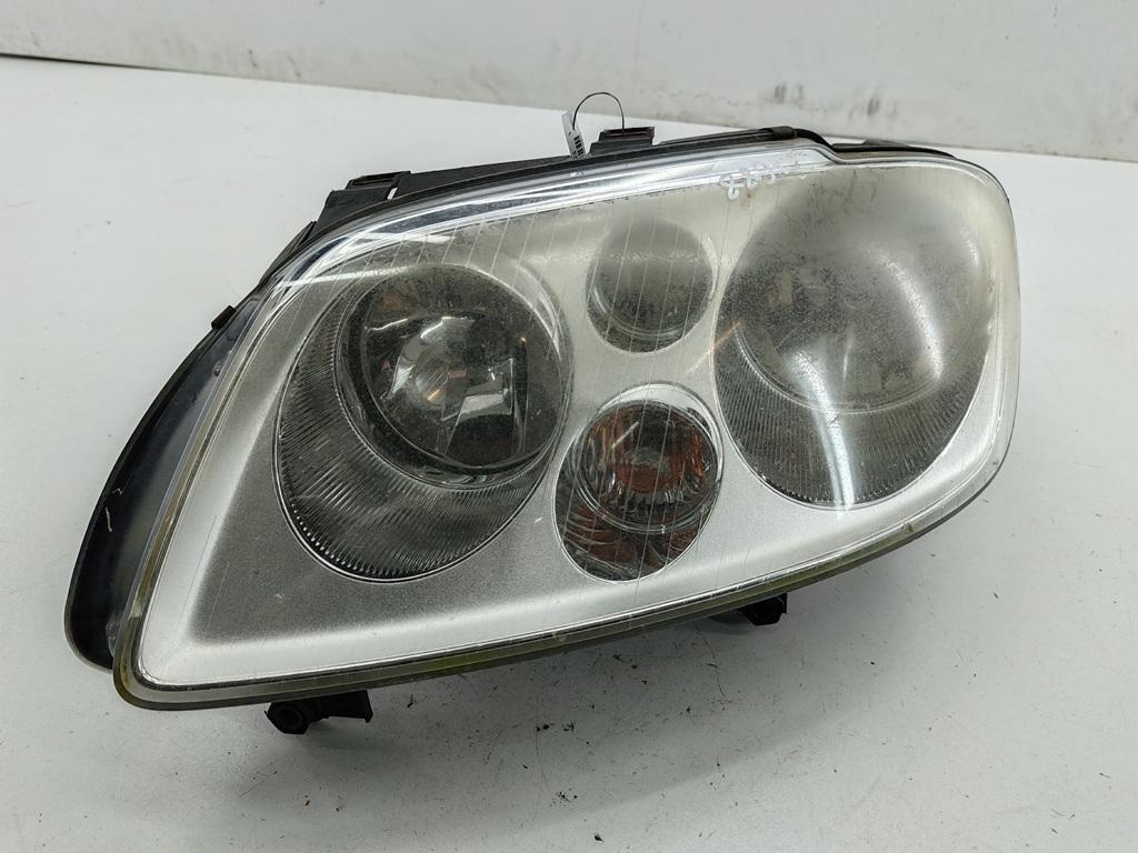 фара левая Volkswagen Touran 1 поколение 2005, 2.0 л., дизель, МКПП, чёрный, минивэн, 1T0941005F - фото №1