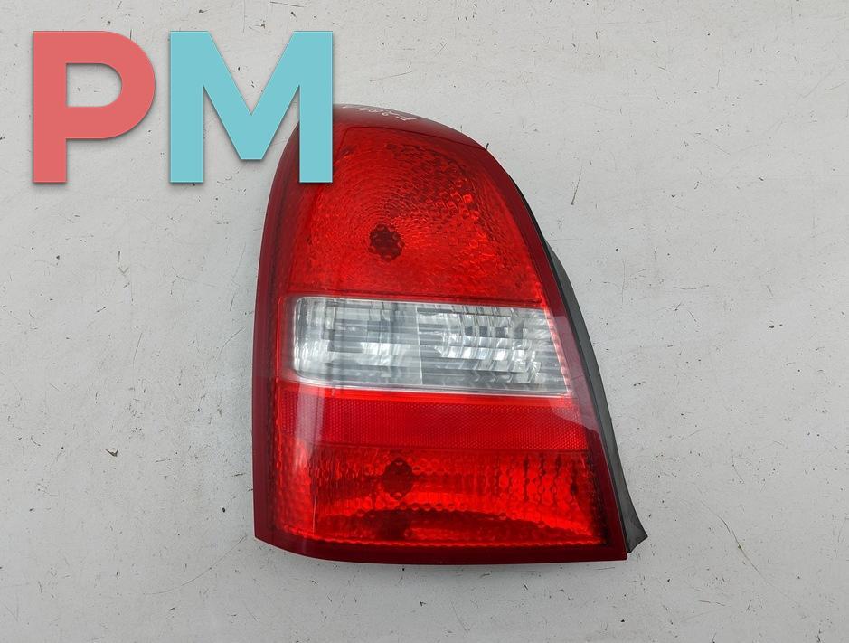 фонарь задний левый Nissan Primera P12 2002, 1.8 л., бензин, МКПП, серый, седан - фото №1