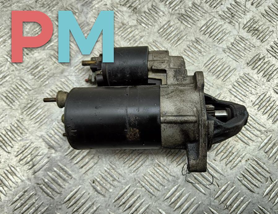 стартер Volkswagen Passat B5 1997, 1.6 л., бензин, МКПП, зелёный, универсал, 0001107068, 058911023B - фото №1