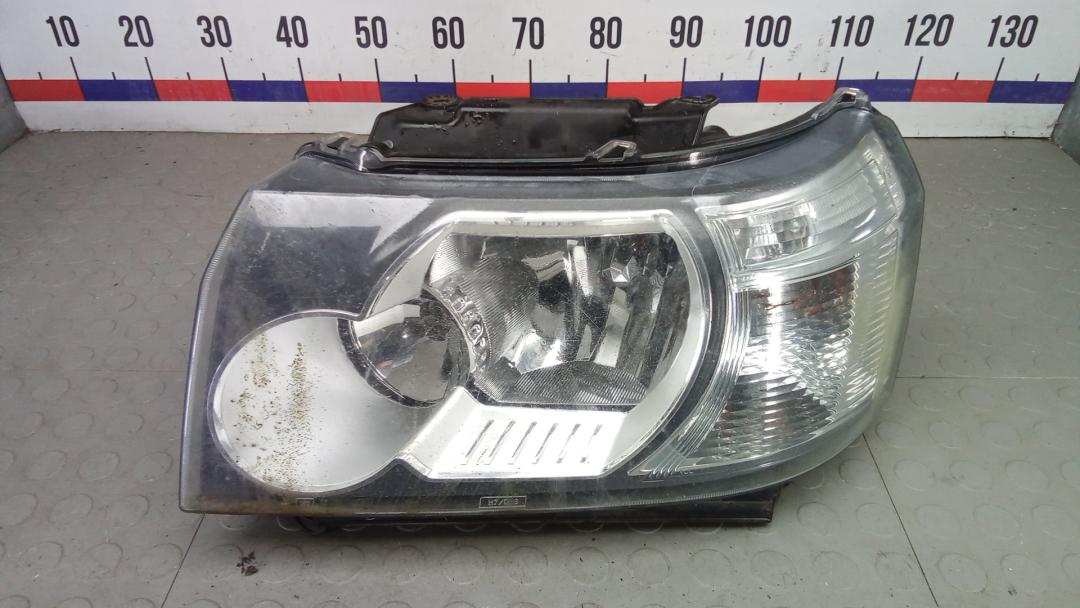 фара левая Land Rover Freelander 2 поколение 2007, 2.2 л., D TD4, дизель, МКПП, внедорожник 5 дв. - фото №1
