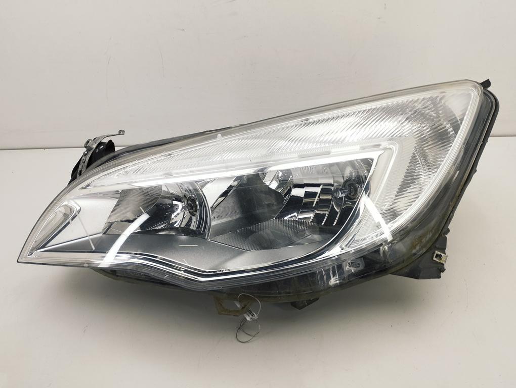 фара левая Opel Astra J 2011, 1.4 л., бензин, МКПП, белый, универсал, 13253646