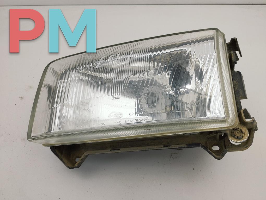 фара левая Volkswagen Transporter T4 1999, 2.5 л., дизель, МКПП, зелёный, микроавтобус - фото №1