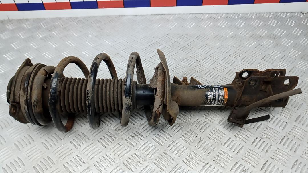 Стойка Nissan Qashqai 2 поколение 2013, 1.6 л., дизель, МКПП, внедорожник 5 дв., 54010JD70B, 54321JD00B, E4303BR24A - фото №1