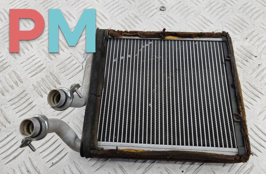 радиатор отопителя (печки) Volkswagen Passat B6 2006, 2.0 л., дизель, МКПП, чёрный, универсал, 3C0819031 - фото №1