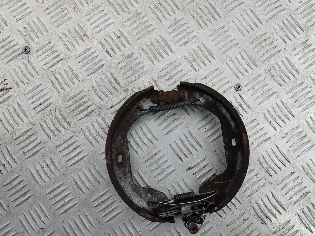 Механизм развода задних тормозных колодок левый BMW 7 E65/E66 2003, 4.4 л., бензин, АКПП, зелёный, седан