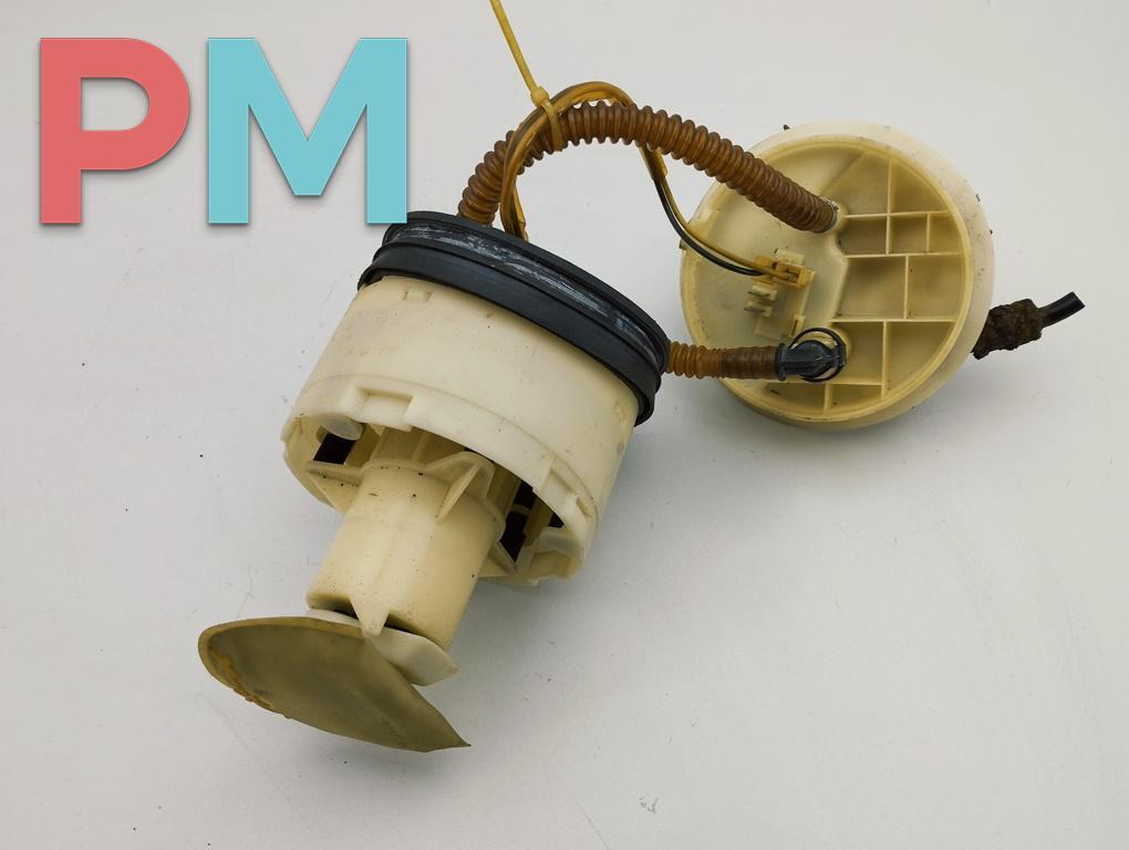 насос топливный Volkswagen Passat B5 1997, 1.8 л., бензин, МКПП, красный, универсал, 8E0906087D - фото №1