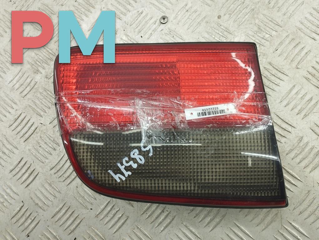 фонарь крышки багажника левый Opel Omega B 1997, 2.0 л., бензин, АКПП, зелёный, седан, 45299 - фото №1