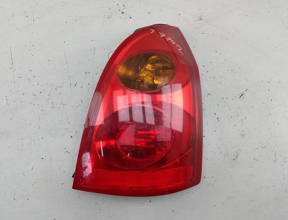 фонарь задний правый Nissan Primera P12 2006, 1.8 л., бензин, МКПП, чёрный, универсал - фото №1