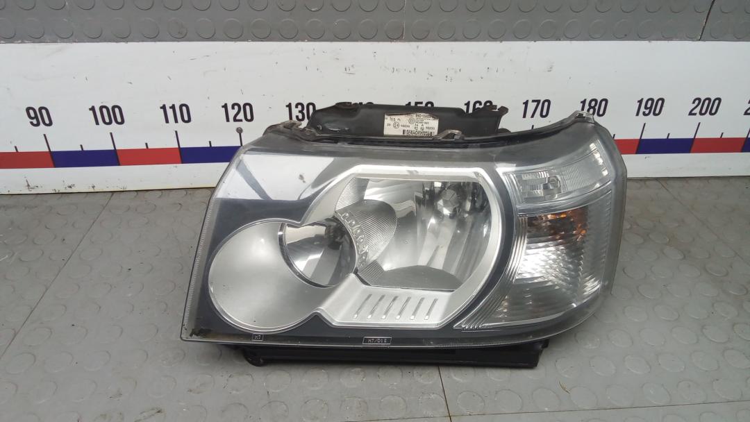 фара левая Land Rover Freelander 2 поколение 2007, 2.2 л., D TD4, дизель, МКПП, внедорожник 5 дв. - фото №1