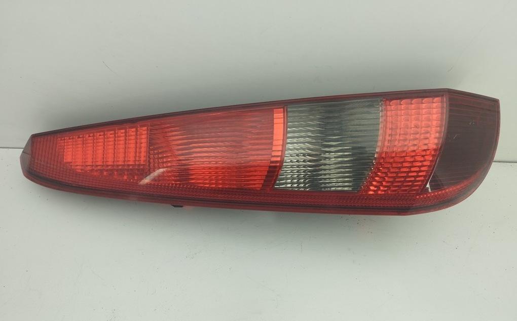 фонарь задний левый Ford Fiesta 5 поколение 2004, 1.3 л., бензин, МКПП, серый, хетчбэк 5 дв. - фото №1