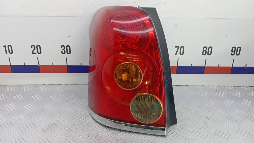 фонарь задний левый Toyota Avensis 2 поколение (T250) 2004, 1.8 л., бензин, МКПП, универсал - фото №1