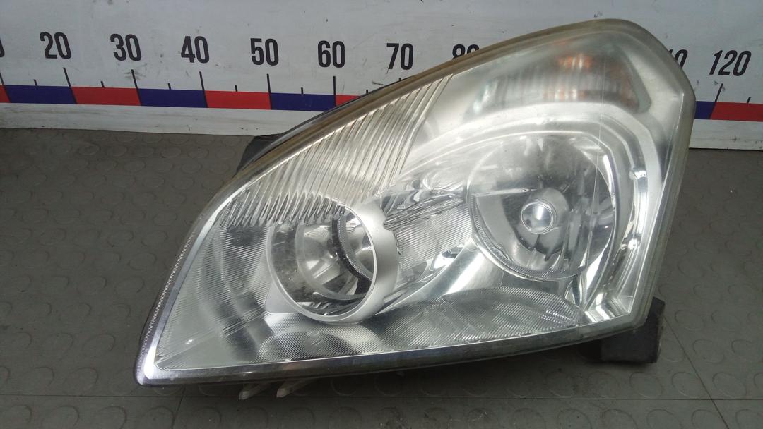фара левая Nissan Qashqai 1 поколение 2008, 1.6 л., бензин, МКПП, внедорожник 5 дв. - фото №1