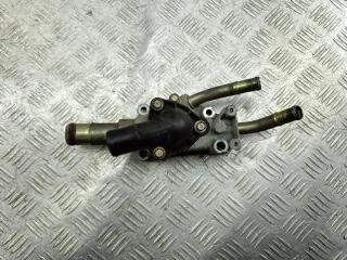 корпус термостата Nissan Primera P12 2006, 1.8 л., бензин, МКПП, чёрный, универсал, 130499F600